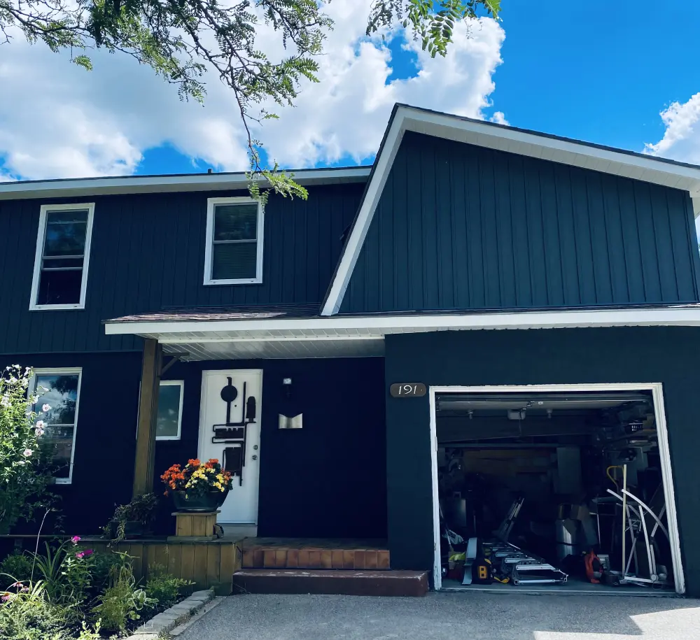 large exterior renovation project in ancaster with new siding, eavestrough, soffit and fascia
